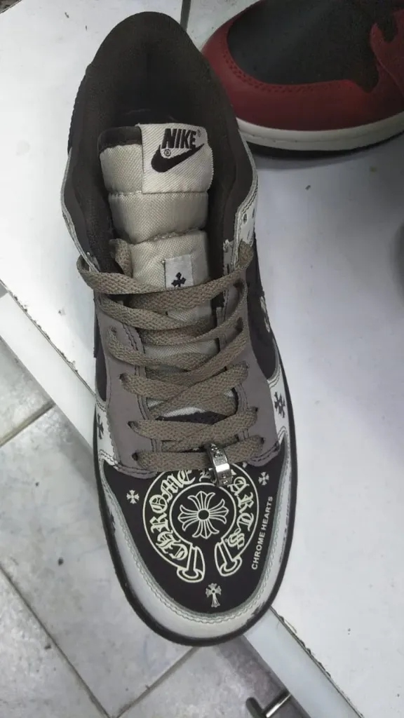 Nike Dunk Low "Chrome Hearts" sneaker. 